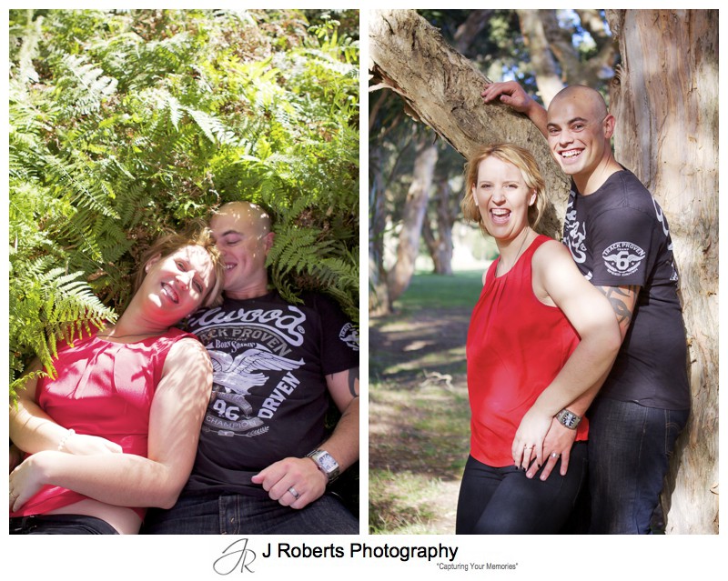 couple laying in grass and leaning on tree in centennial park - couple portrait photography - sydney