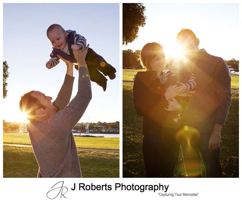 Little boy being thrown up in the air by his dad with setting sun behind - family portrait photography sydney