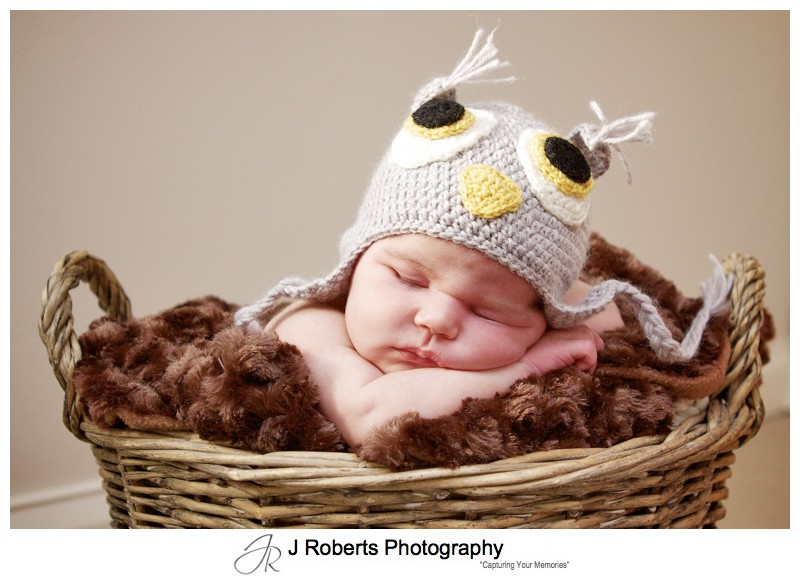 Little baby with a knitted owl beanie - newborn baby portrait photography sydney