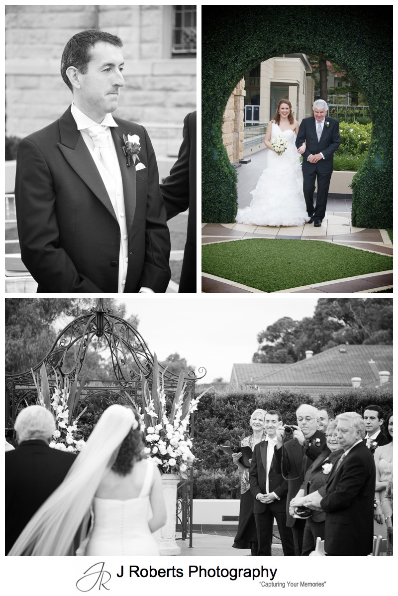 Groom watching bride walk down the aisle = wedding photography sydney