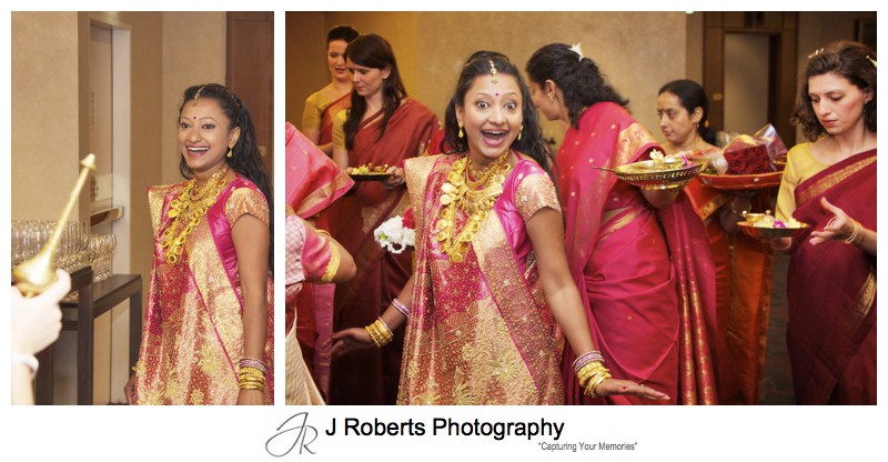 Bride about to enter the hindu marriage blessing - wedding photography sydney