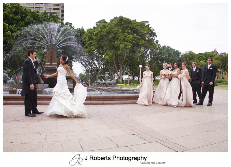 Bride and groom dancing in Hyde Park with Bridal party - wedding photography sydney