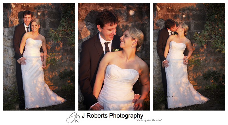 Bride and groom in pinky orange setting sunlight - wedding photography sydney