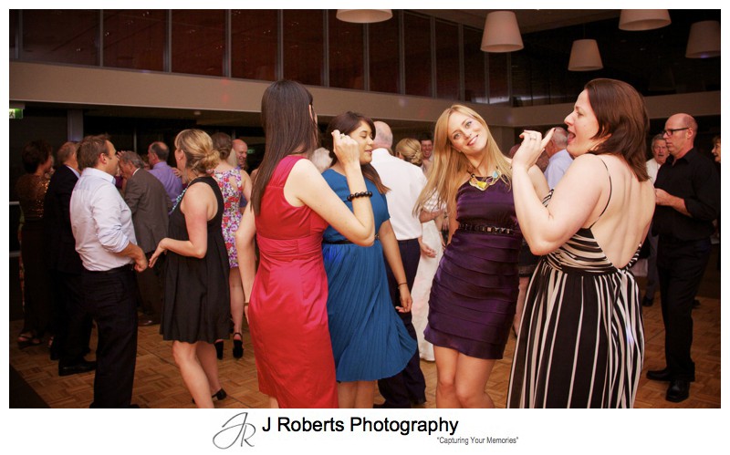 Fun dance floor action at wedding reception - wedding photography sydney