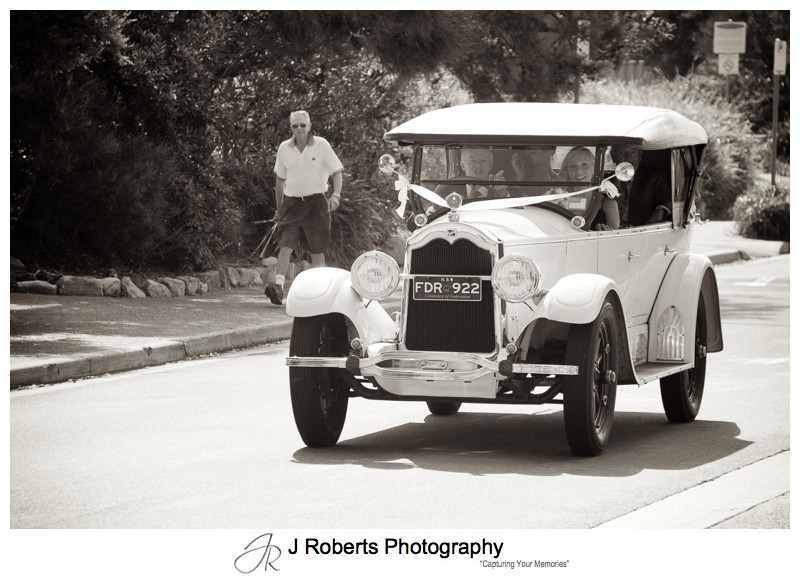 Bride arriving in a 1930 buick - wedding photography sydney
