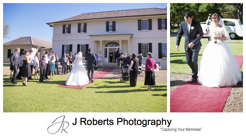 Bride walking down the red carpet on the lawns of Old Government House Parramatta - wedding photography sydney