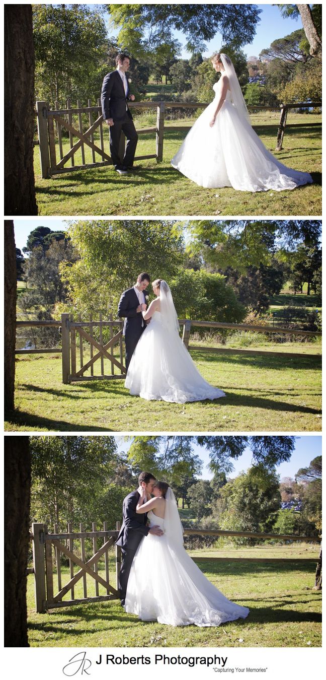 Bride and groom with rustic fence at Old Government House Parramatta - wedding photography sydney