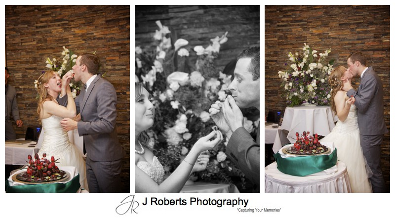 Bride and groom sharing strawberry tower wedding cake - wedding photography sydney