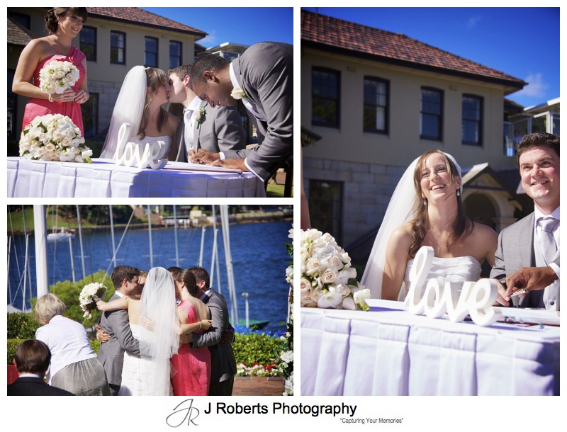 Bride and groom signing the register and a group hug - wedding photography sydney