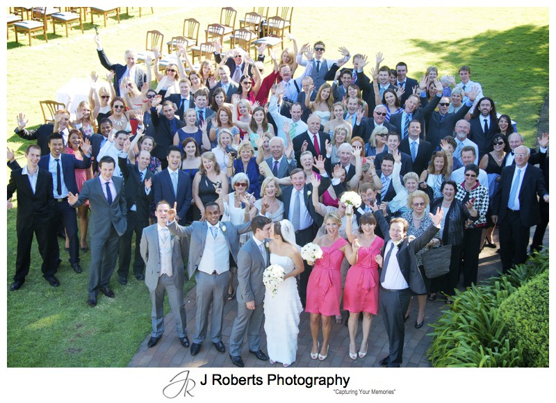 All the guests cheering at the wedding - wedding photography sydney