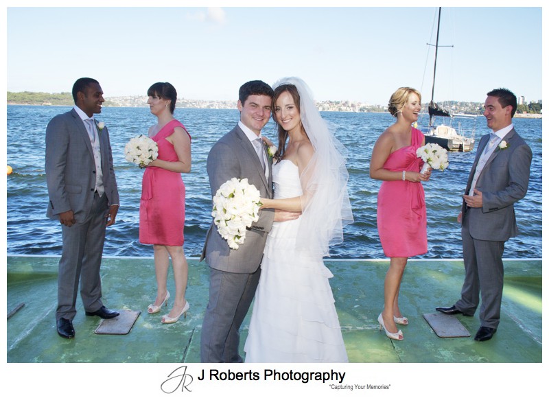 Bridal party on the pontoon at RSYS - wedding photography sydney